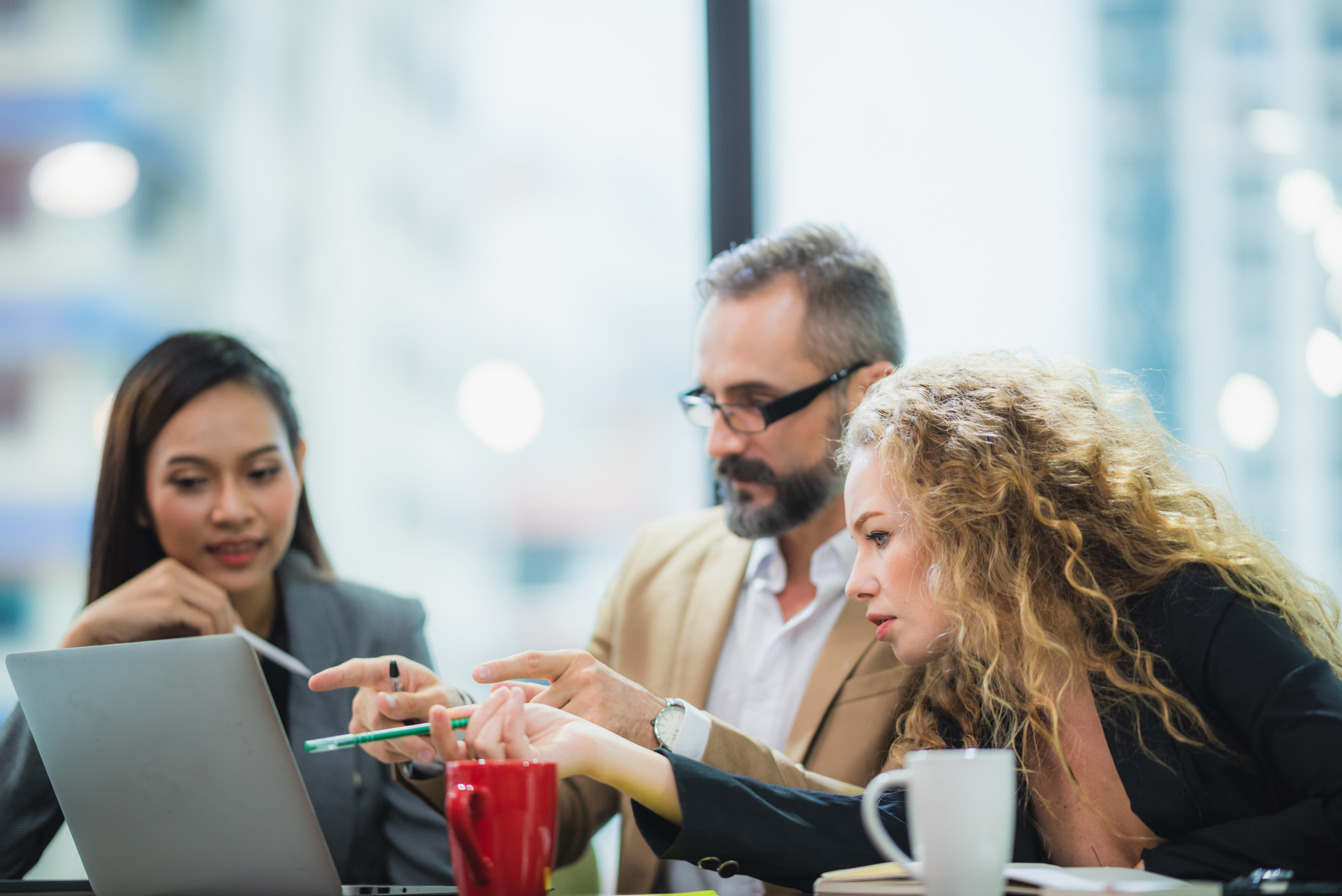 The successful friend businessman and woman is meeting and discussing for team project presentation at the co-working space office. The concept of knowledge sharing and conference successful by using labtop and mobile smart phone knowledge transfer and sharing larry prusak on the meetinvr blog